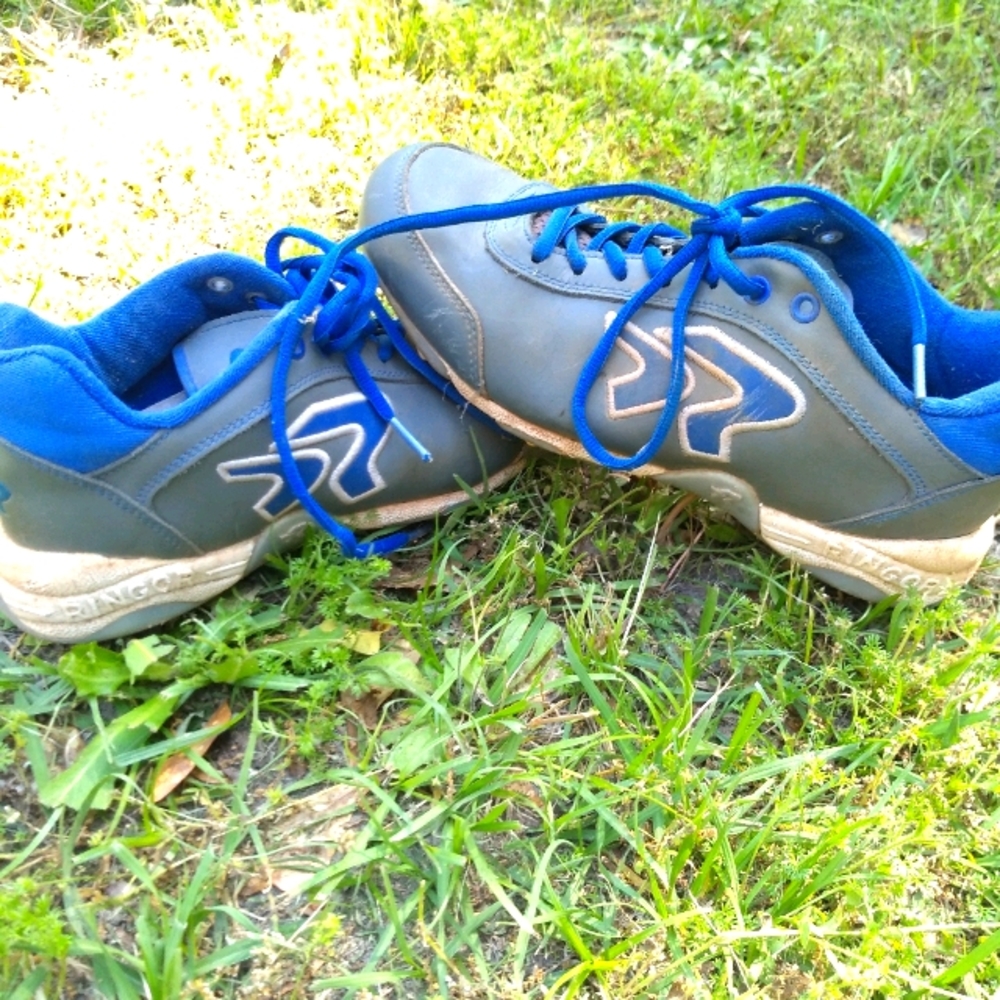 Blue and grey softball cleats